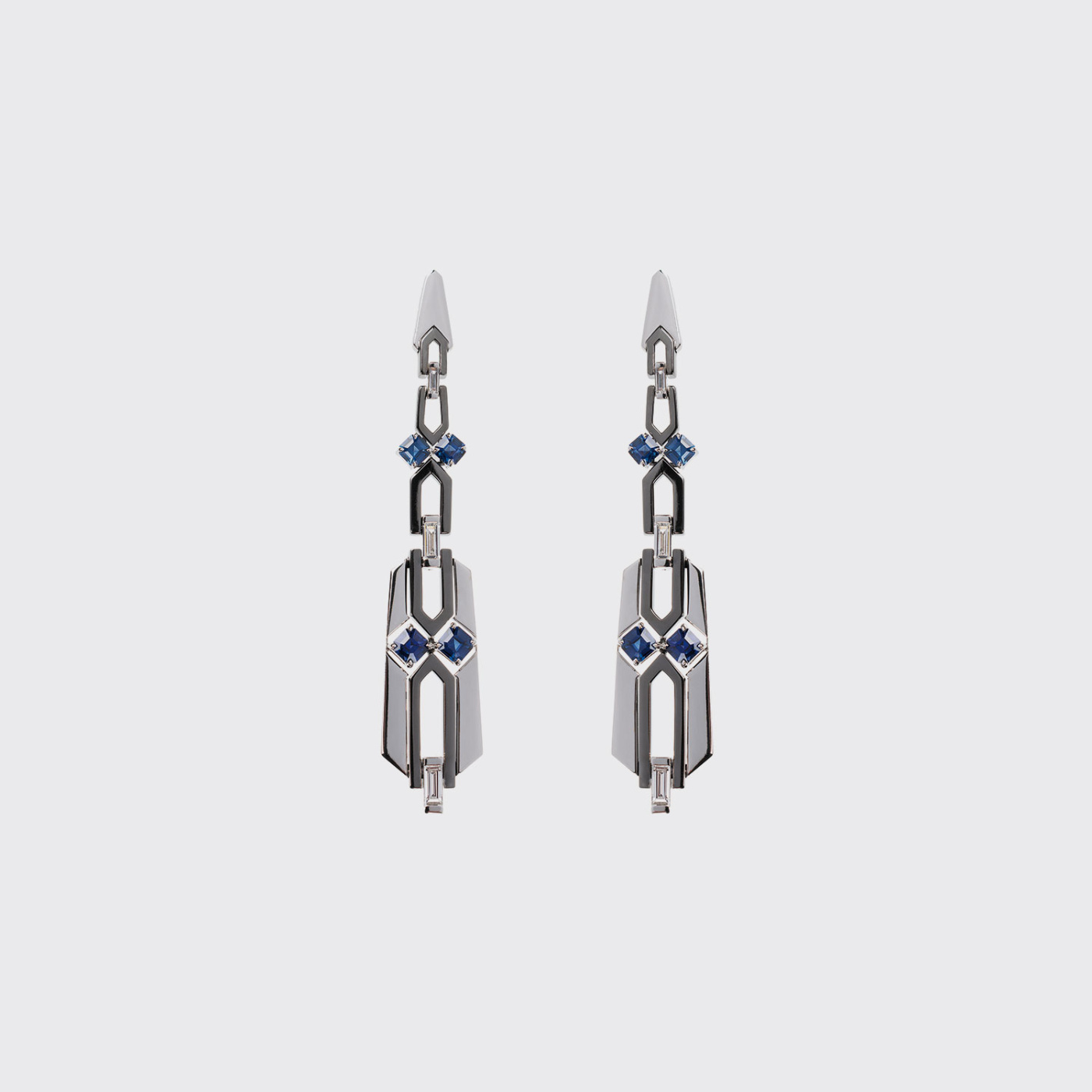 White and black long gold earrings with blue sapphires and white diamonds
