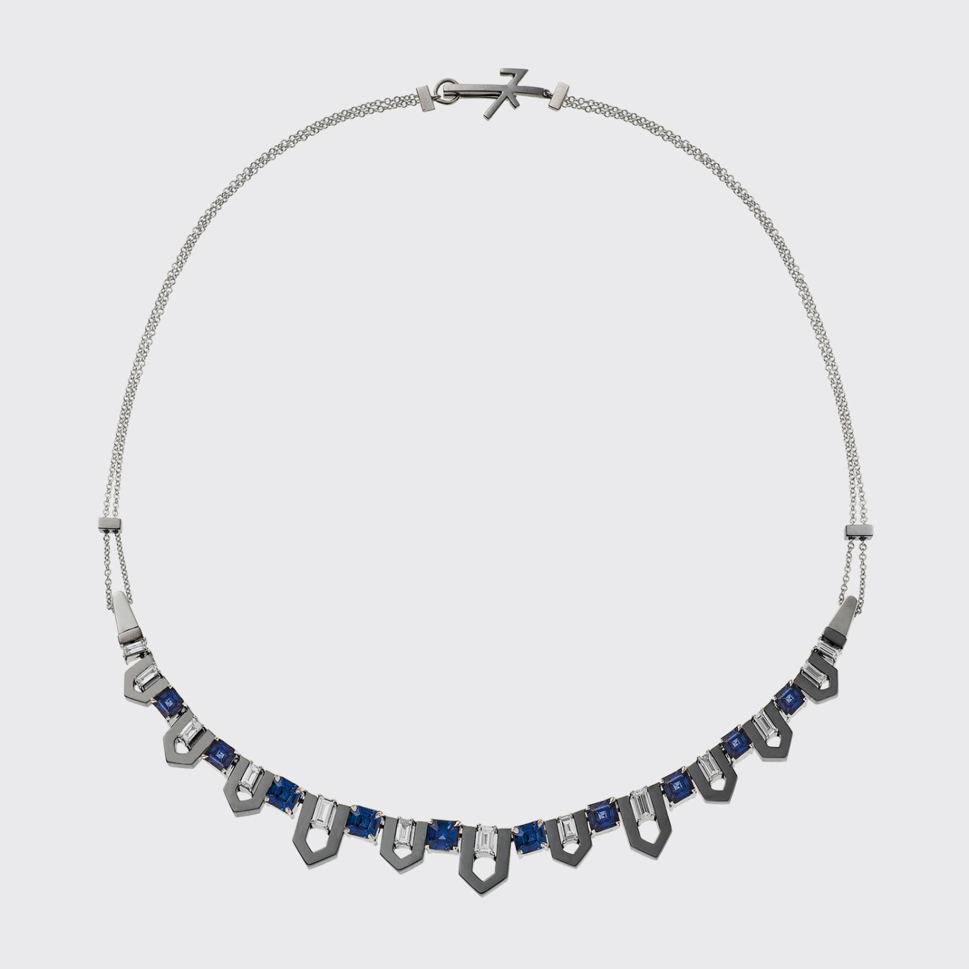 White and black gold necklace with blue sapphires and white diamonds