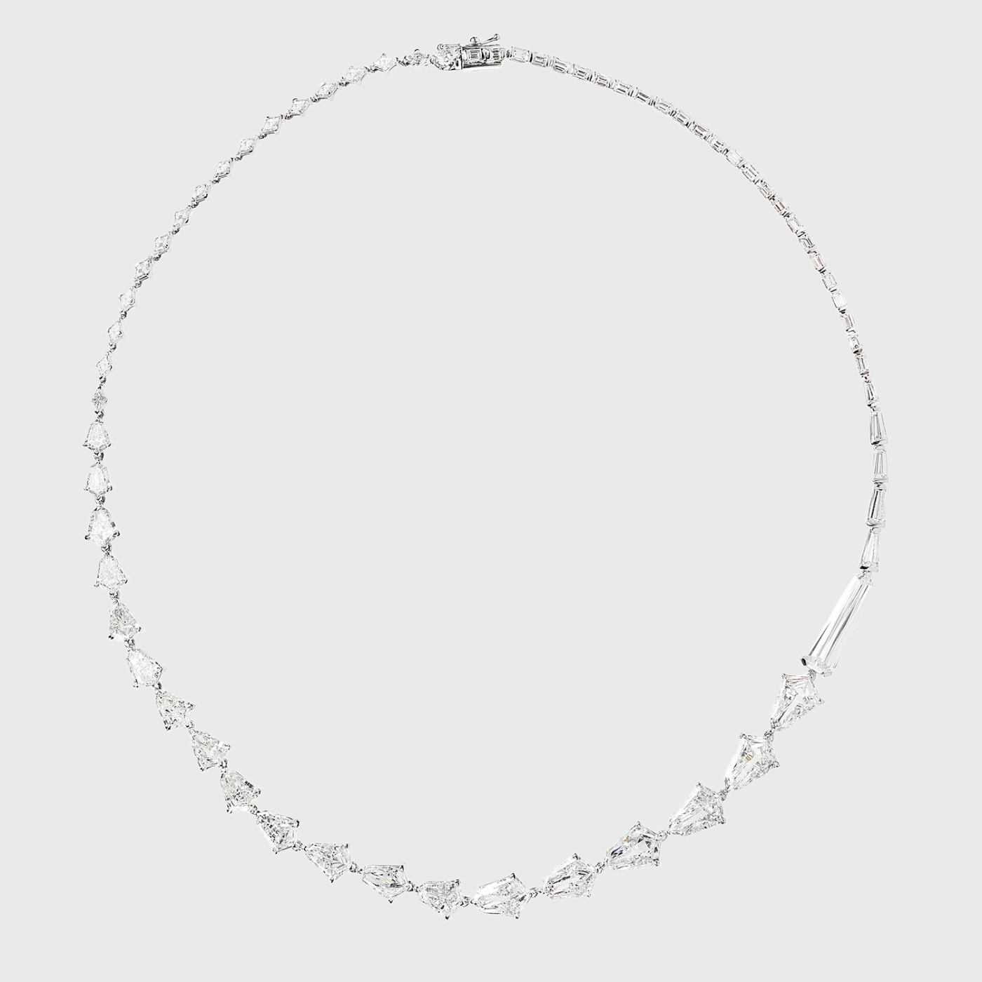 White gold necklace with white shield cut and tapered baguette white diamonds