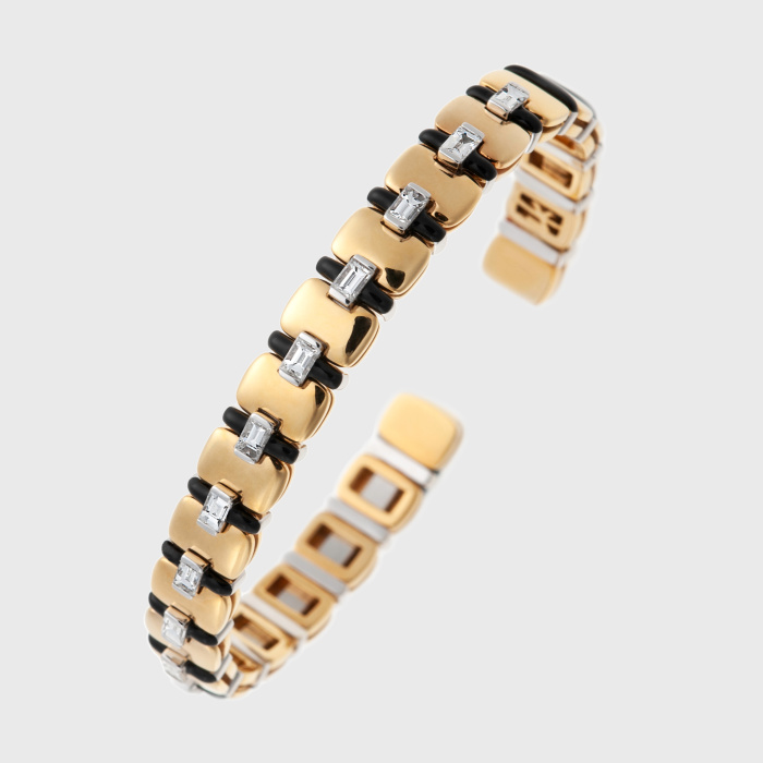 Yellow gold bangle bracelet with white diamonds and black enamel