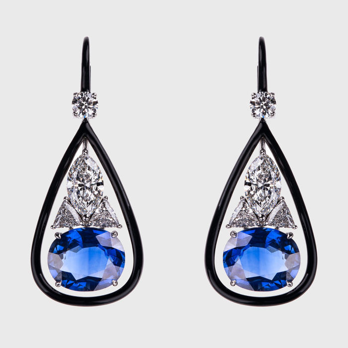 White gold earrings with oval blue sapphires, pear shape, round and trillion white diamonds and black enamel