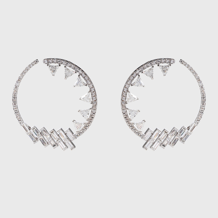 White gold hoop earrings with round, trillion and baguette white diamonds