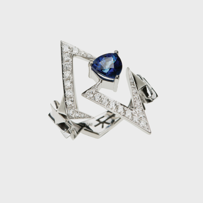 White gold ring with white diamonds and sapphire