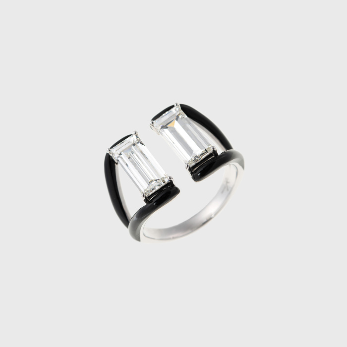 White gold ring with emerald cut white diamonds and black enamel