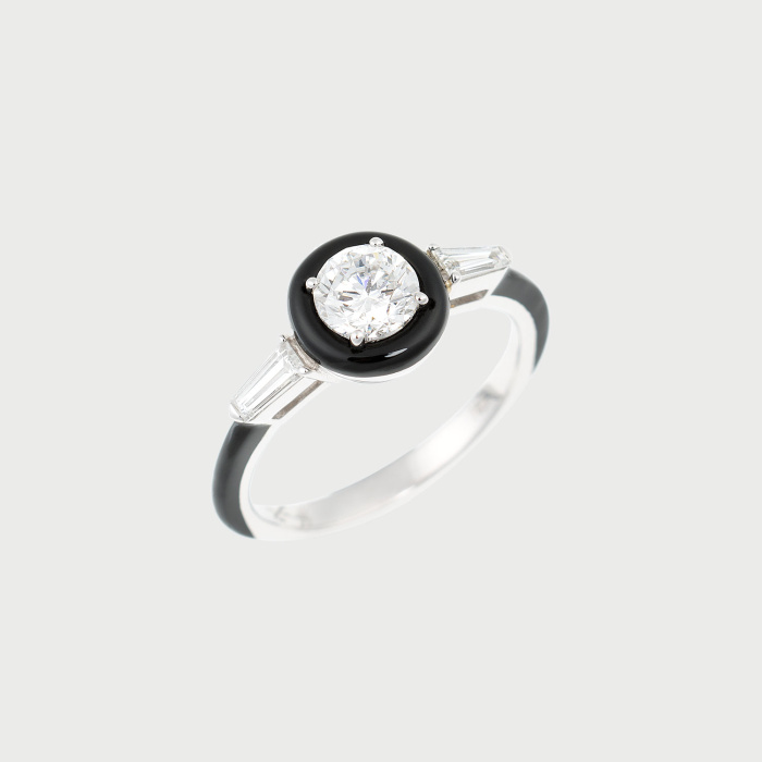 White gold ring with round and tapered baguette white diamonds and black enamel