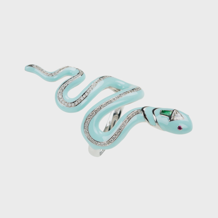 White gold snake ring with white diamonds, emerald, rubies and light blue enamel