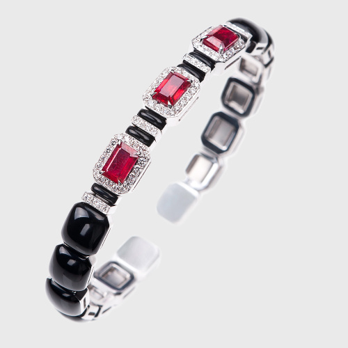 White gold bangle bracelet with rubies, white diamonds and black enamel
