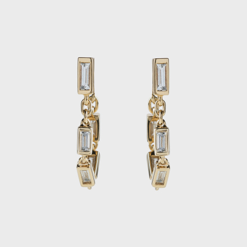 Yellow gold small earrings with white diamond baguettes