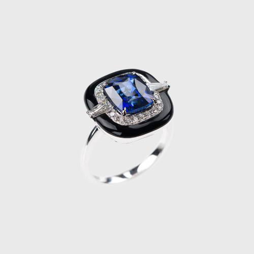 White gold ring with cushion blue sapphire, white diamonds and black enamel