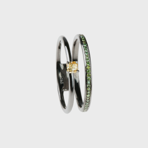 Black gold ring with green diamonds and yellow diamond